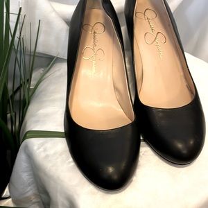 Mid wedge closed toe dress pump